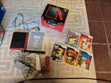 Nintendo console wii mini red in doos met 5 games  beschikbaar voor biedingen