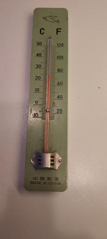 oude thermometer in hout.
