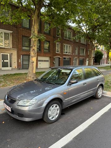 Mazda 323F 57,000km, Autos, Argent ou Gris, 50 kW, Entreprise, 2 places