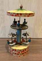 Antiek blikken speelgoed carrousel, Ophalen