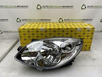 Koplamp Links Renault Twingo 2 NIEUW ORIGINEEL 26060902R beschikbaar voor biedingen