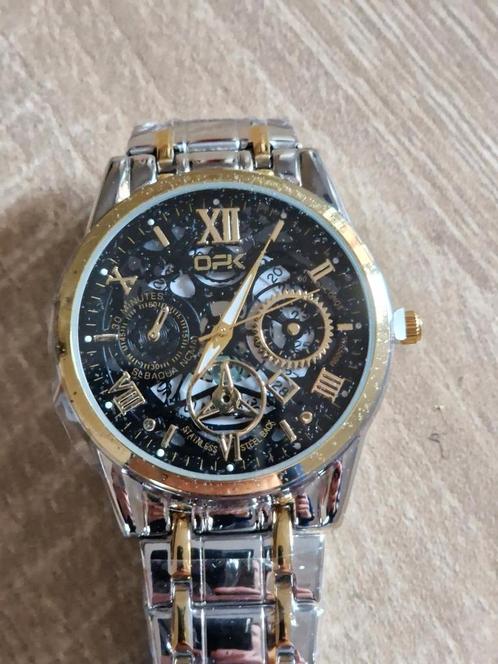 Skeleton heren horloge met dagaanduiding. Nieuw., Handtassen en Accessoires, Horloges | Heren, Nieuw, Ophalen of Verzenden