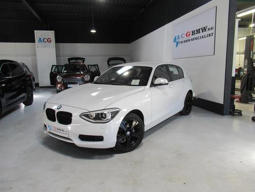 BMW 114   i Benz Navigatie Xenon Zetelverw Sportstuur PDC, Auto's, BMW, 1 Reeks, ABS, Airbags, Airconditioning, Alarm, Bluetooth