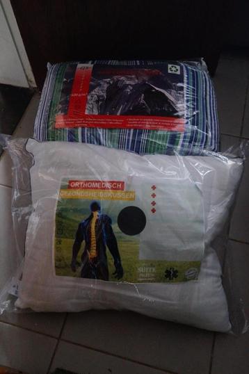 Groot en warm dekbed met hoofdkussen beschikbaar voor biedingen