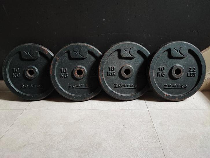 4 x 10kg plaques de musculation de Domyos (28mm)., Sports & Fitness, Équipement de fitness, Utilisé, Plaques d'haltères, Bras