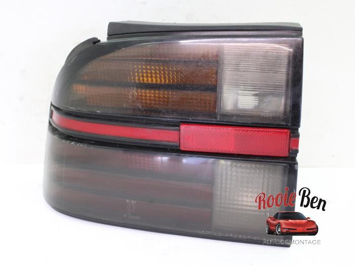 Feu arrière gauche d'un Chevrolet Beretta, -, 3 mois de garantie, Utilisé, -