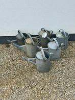 Lot oude gieters, Ophalen