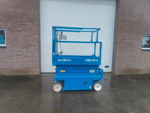 Skyjack SJIII 3219 schaarlift (nieuwe batterijen), Zakelijke goederen, Machines en Bouw | Liften, Steigers en Ladders, Ophalen of Verzenden