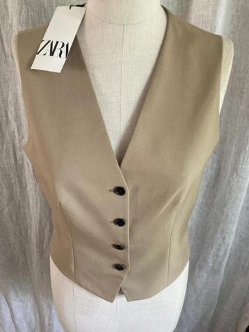 Gilet beige met prijskaartje maat small beschikbaar voor biedingen