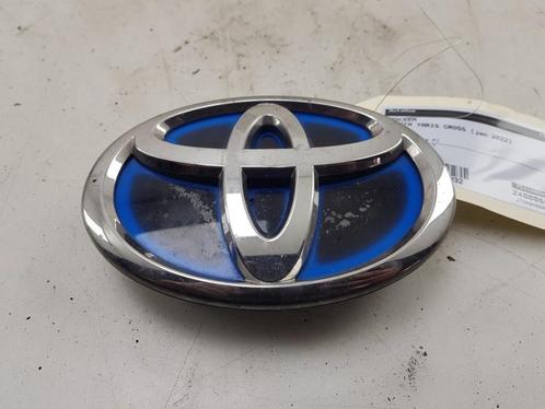 EMBLEEM Toyota Yaris Cross (PB1 / PJ1) (01-2020/-), Auto-onderdelen, Overige Auto-onderdelen, Toyota, Gebruikt