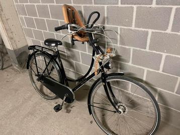Damesfiets met zitje. beschikbaar voor biedingen
