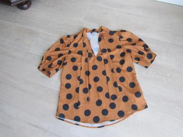 Nife oranje blouses met blauwe bollen maat 42