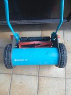 Hand grasmaaier, Ophalen