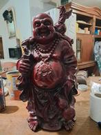 Lachende Boeddha, Ophalen