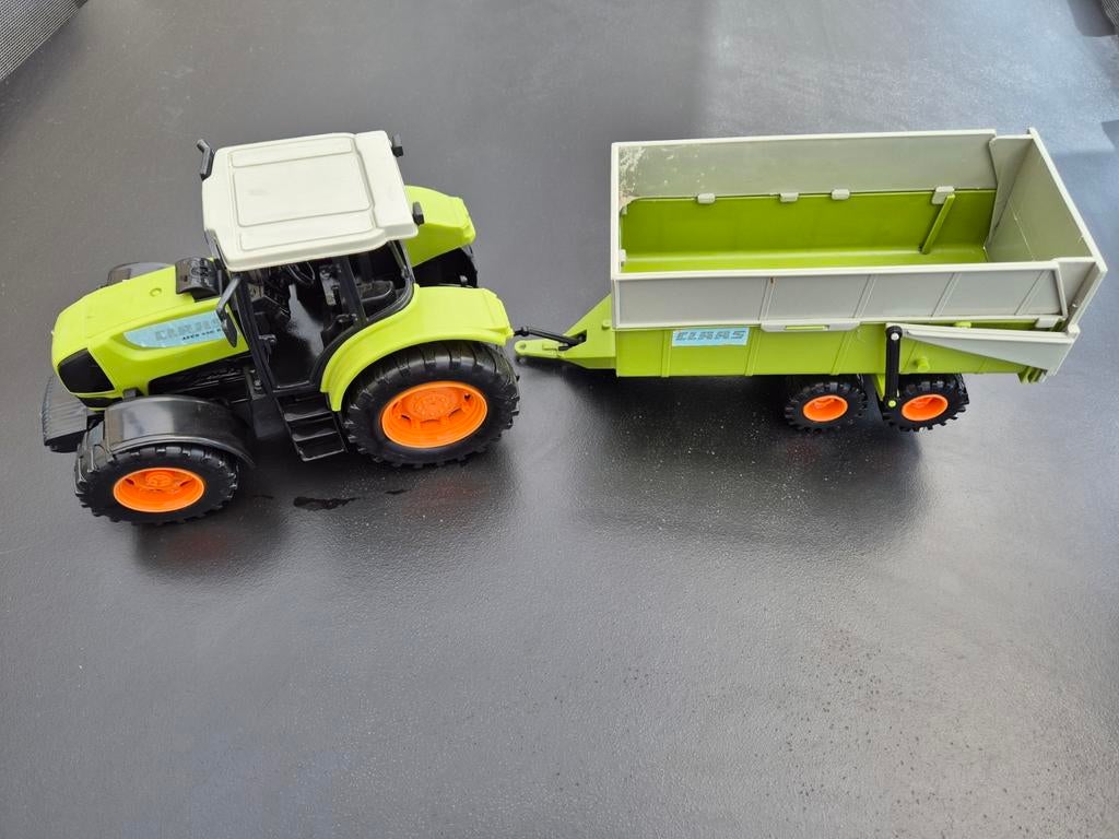 Tractor met laadbak CLAAS, Ophalen
