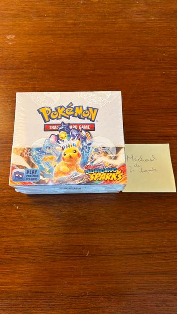 Surging Sparks Sealed booster box beschikbaar voor biedingen