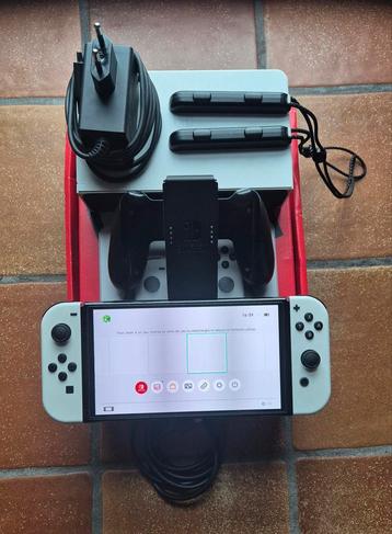 Nintendo switch oled compleet + garantie  beschikbaar voor biedingen