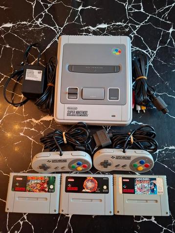Super Nintendo-console + 3 games + 2 controllers enz... NIEU beschikbaar voor biedingen