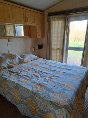 Vend caravane  residentielle diksmuide  près d un etang