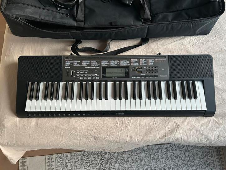 Clavier Casio LK-265 + housse, support, chaise et casque, Muziek en Instrumenten, Keyboards, Zo goed als nieuw, Casio, Ophalen of Verzenden