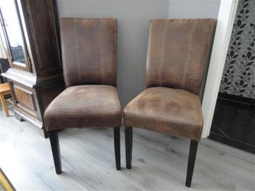 2 Stoelen met nubuckleder “ NIEUW “ amper gebruikt 50 €/st disponible aux enchères