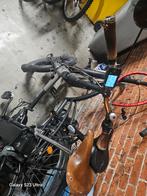 Een kapotte fiets die gelast moet worden., Enlèvement ou Envoi