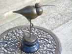 een vogel met een lange snavel in brons gesigneerd. JUNO., Antiek en Kunst, Antiek | Brons en Koper, Ophalen, Brons