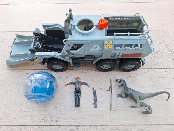 Jurassic World - camion lance-gyrosphère avec Owen et Blue, Kinderen en Baby's, Speelgoed | Actiefiguren, Gebruikt, Ophalen of Verzenden