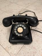 Mooie oude bakelieten telefoon, Ophalen