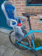 Kinderzitje achteraan op de fiets, Ophalen
