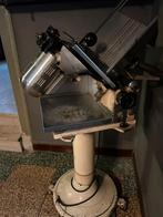 Vintage snijmachine, Ophalen