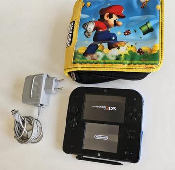 Nintendo 2 DS console met 4 games en Mario tas beschikbaar voor biedingen