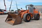 Hitachi LX 210E- stock id 59 (bj 2004), Zakelijke goederen, Machines en Bouw | Kranen en Graafmachines, Wiellader of Shovel