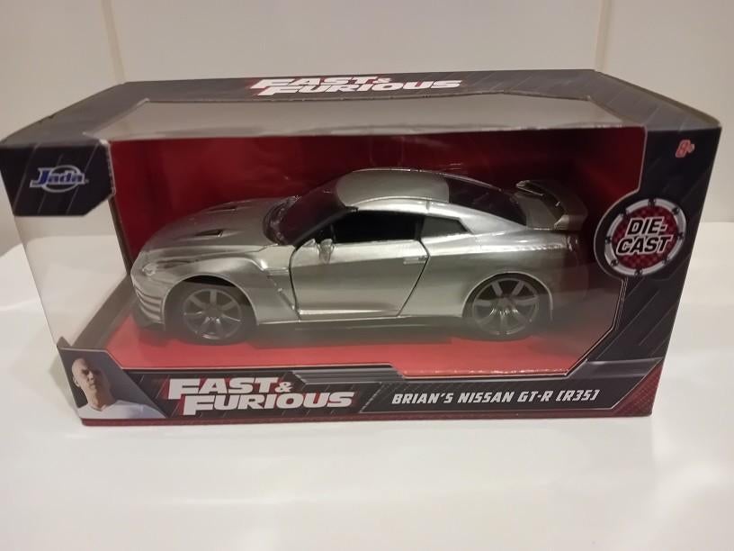 BRIAN'S NISSAN GT-R ( R35 ) uit FAST & FURIOUS, Hobby & Loisirs créatifs, Voitures miniatures | 1:32, Enlèvement ou Envoi, Comme neuf