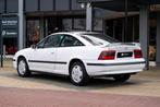 Opel Calibra 2.0i 16V (bj 1996), Auto's, Zwart, 136 pk, Wit, Leder