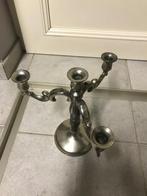 Tinnen kaarsenhouder, Enlèvement