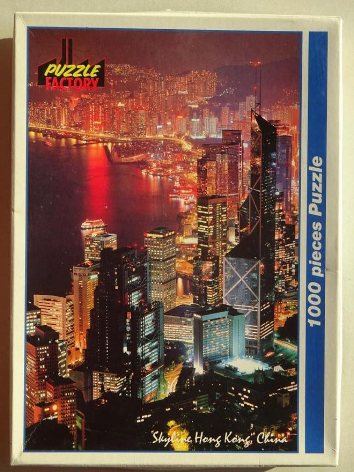Puzzel 1000 st Hong Kong Skyline 4 + 1 gratis, Hobby en Vrije tijd, Denksport en Puzzels, Zo goed als nieuw, Legpuzzel, 500 t/m 1500 stukjes