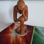 Houten beeld, Ophalen