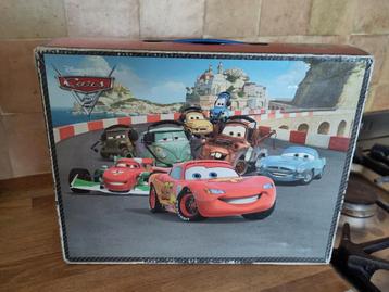 Doos met 4 puzzels Cars (2x64 en 2x81 stukken) beschikbaar voor biedingen