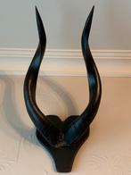 Hoorn in afrikaans hout, Ophalen