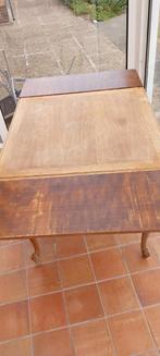 Antieke tafel met twee uittrekstukken, Ophalen