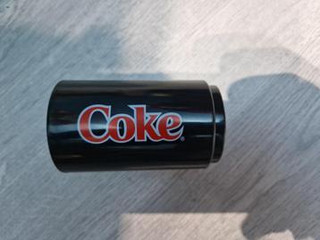 Moderne zwarte flesopener van Coca-Cola beschikbaar voor biedingen