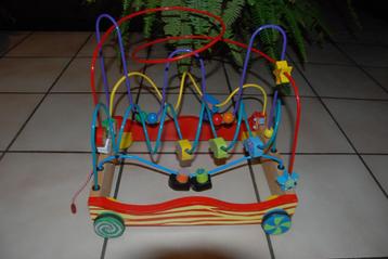 Babywagen met houten motorspelletjes zoals NIEUW beschikbaar voor biedingen