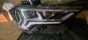 Audi Q3 koplamp rechts beschikbaar voor biedingen