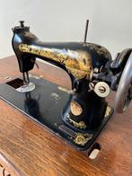 Oude Singer naaimachine, Ophalen