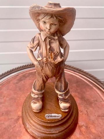 Leuk oud beeldje beschikbaar voor biedingen