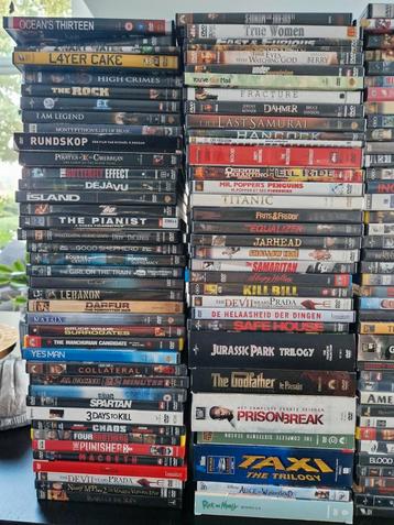 +/- 200 DVD's in opbergbox + DVD-speler met scart naar HDMI beschikbaar voor biedingen