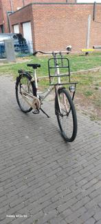 Damesfiets zonder versnellingen remterugtrapen, Ophalen