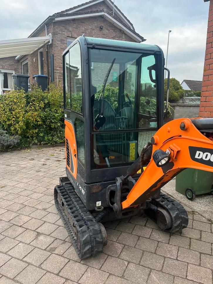 Doosan Dx19 bj 2015 met 2660 uur 1ste eigenaar, Zakelijke goederen, Machines en Bouw | Kranen en Graafmachines, Ophalen