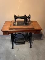 Naaimachine vici, Ophalen